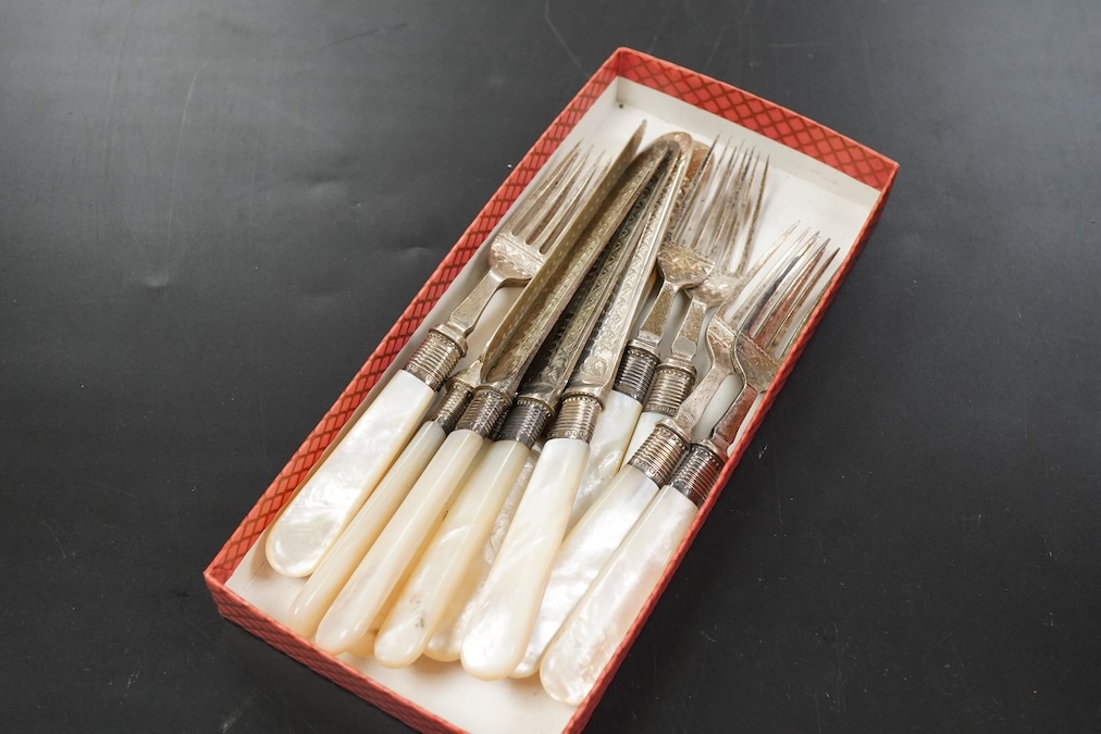 A set of six late Victorian mother pearl handled silver fruit knives and forks length 19.4 cm.